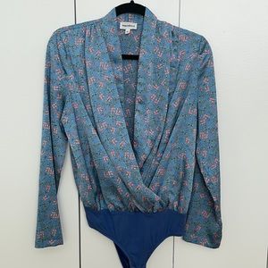 Revolve brand Superdown floral body suit
